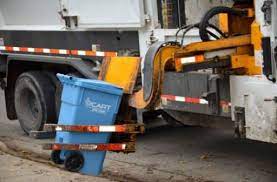Glitch causes trash collection billing problem in Lansing