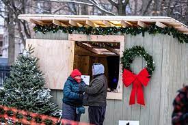 Downtown Lansing Inc. draws criticism for holiday market in park frequented by homeless